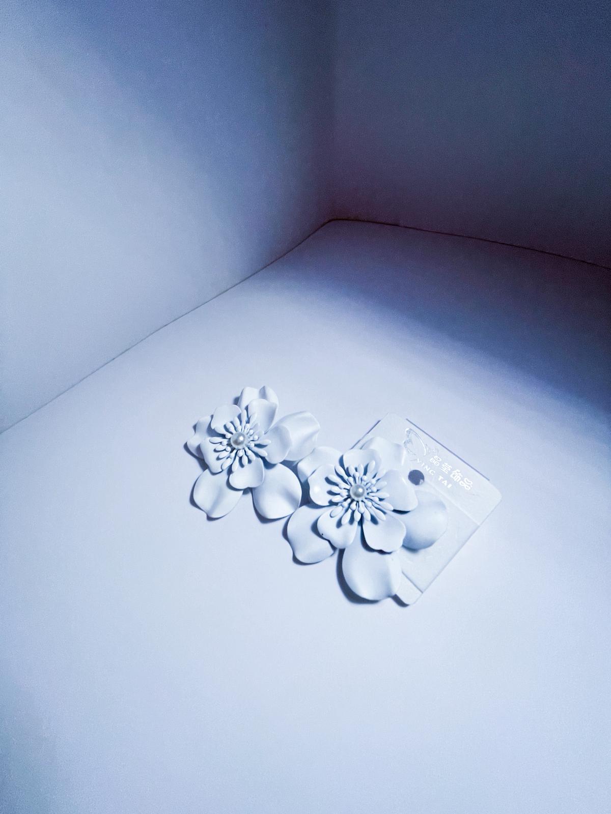 White flowered earing